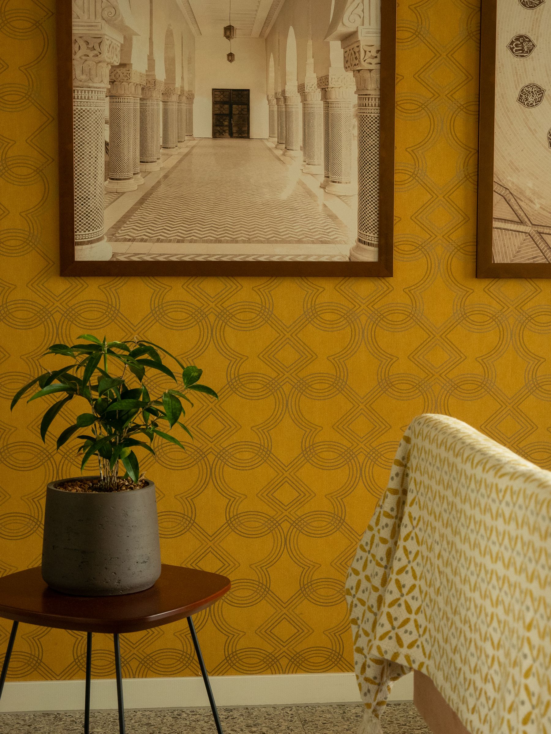 Warm yellow patterned wallcovering in a finished interior