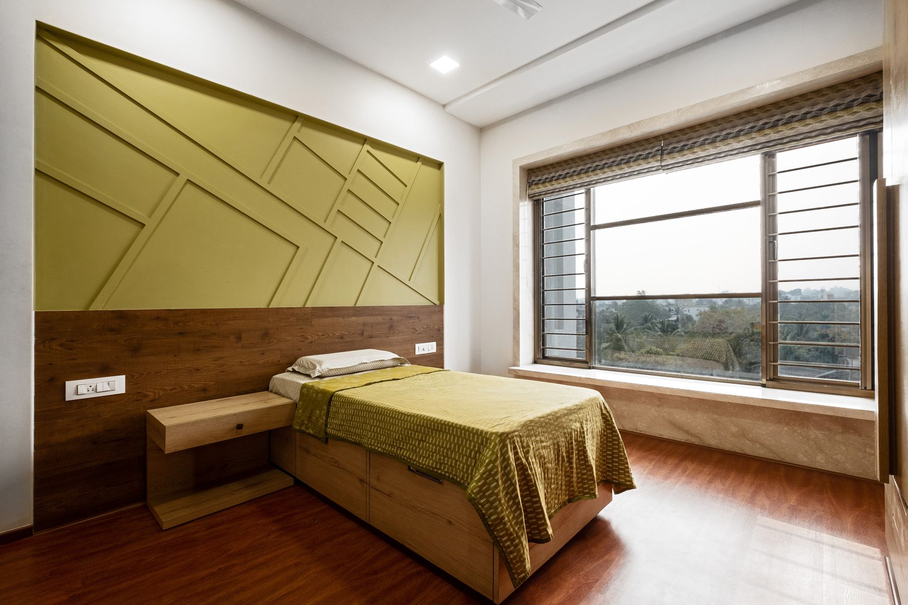 Finished modern bedroom with accent wallcovering